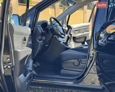 Черный Киа Каренс, объемом двигателя 2 л и пробегом 148 тыс. км за 7250 $, фото 13 на Automoto.ua