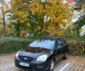 Чорний Кіа Каренс, об'ємом двигуна 1.99 л та пробігом 233 тис. км за 3500 $, фото 3 на Automoto.ua