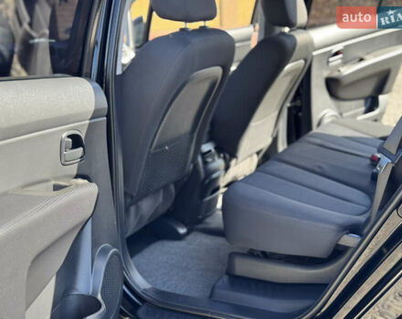 Черный Киа Каренс, объемом двигателя 2 л и пробегом 148 тыс. км за 7250 $, фото 15 на Automoto.ua