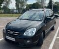 Чорний Кіа Каренс, об'ємом двигуна 2 л та пробігом 311 тис. км за 5900 $, фото 1 на Automoto.ua