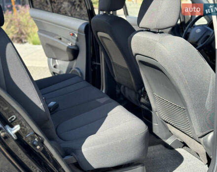 Черный Киа Каренс, объемом двигателя 2 л и пробегом 148 тыс. км за 7250 $, фото 18 на Automoto.ua