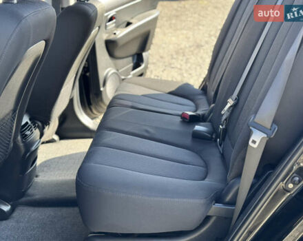 Черный Киа Каренс, объемом двигателя 2 л и пробегом 148 тыс. км за 7250 $, фото 16 на Automoto.ua