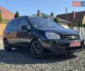 Черный Киа Каренс, объемом двигателя 2 л и пробегом 148 тыс. км за 7250 $, фото 1 на Automoto.ua