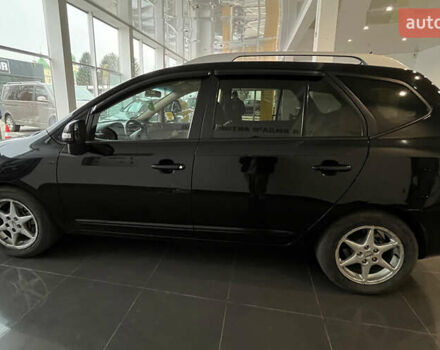 Чорний Кіа Каренс, об'ємом двигуна 1.58 л та пробігом 269 тис. км за 7500 $, фото 3 на Automoto.ua