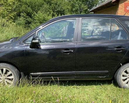 Чорний Кіа Каренс, об'ємом двигуна 2 л та пробігом 674 тис. км за 10000 $, фото 6 на Automoto.ua