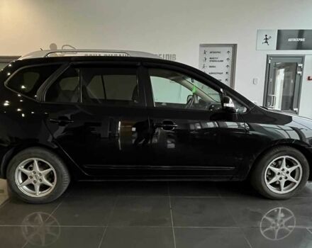 Черный Киа Каренс, объемом двигателя 1.6 л и пробегом 269 тыс. км за 7500 $, фото 7 на Automoto.ua