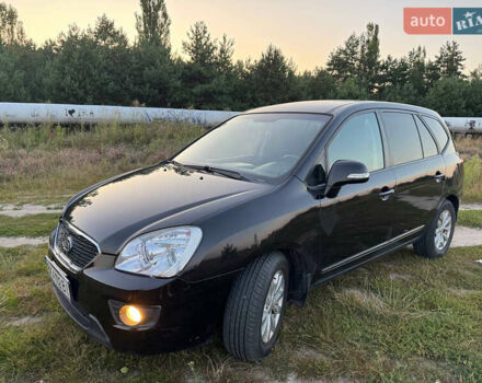 Чорний Кіа Каренс, об'ємом двигуна 2 л та пробігом 142 тис. км за 8700 $, фото 1 на Automoto.ua