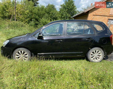 Чорний Кіа Каренс, об'ємом двигуна 2 л та пробігом 674 тис. км за 10000 $, фото 5 на Automoto.ua