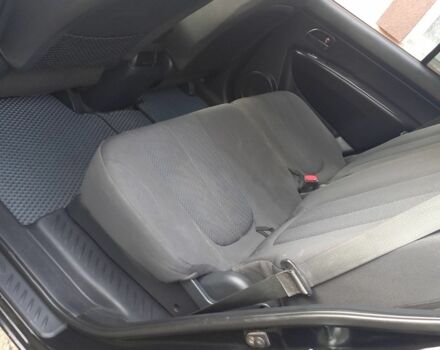 Черный Киа Каренс, объемом двигателя 2 л и пробегом 240 тыс. км за 6750 $, фото 12 на Automoto.ua