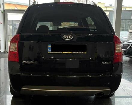 Черный Киа Каренс, объемом двигателя 1.6 л и пробегом 269 тыс. км за 7500 $, фото 5 на Automoto.ua