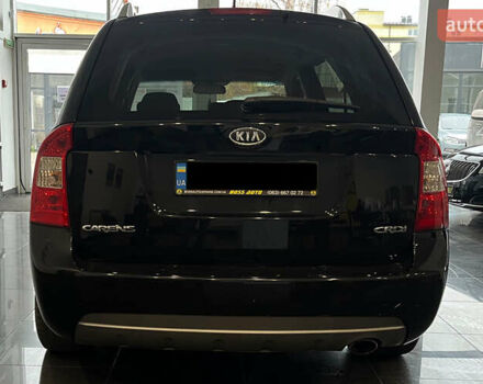 Чорний Кіа Каренс, об'ємом двигуна 1.58 л та пробігом 269 тис. км за 7500 $, фото 5 на Automoto.ua