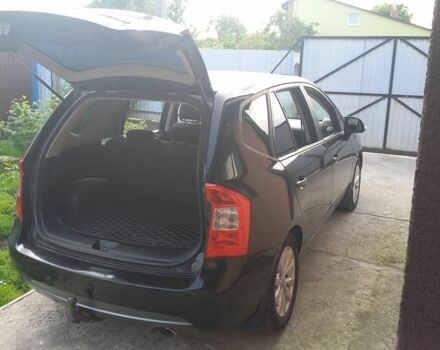 Черный Киа Каренс, объемом двигателя 2 л и пробегом 240 тыс. км за 6750 $, фото 4 на Automoto.ua