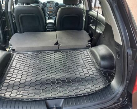 Черный Киа Каренс, объемом двигателя 2 л и пробегом 240 тыс. км за 6750 $, фото 13 на Automoto.ua