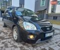 Чорний Кіа Каренс, об'ємом двигуна 1.6 л та пробігом 277 тис. км за 6299 $, фото 1 на Automoto.ua