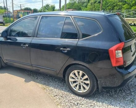 Черный Киа Каренс, объемом двигателя 2 л и пробегом 240 тыс. км за 6750 $, фото 5 на Automoto.ua