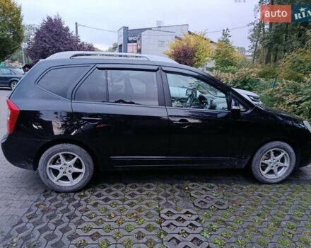 Черный Киа Каренс, объемом двигателя 1.58 л и пробегом 268 тыс. км за 6900 $, фото 2 на Automoto.ua
