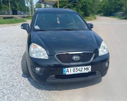 Черный Киа Каренс, объемом двигателя 2 л и пробегом 240 тыс. км за 6750 $, фото 2 на Automoto.ua