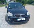 Черный Киа Каренс, объемом двигателя 2 л и пробегом 240 тыс. км за 6750 $, фото 2 на Automoto.ua