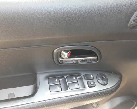 Черный Киа Каренс, объемом двигателя 2 л и пробегом 240 тыс. км за 6750 $, фото 10 на Automoto.ua