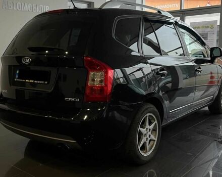 Черный Киа Каренс, объемом двигателя 1.6 л и пробегом 269 тыс. км за 7500 $, фото 6 на Automoto.ua