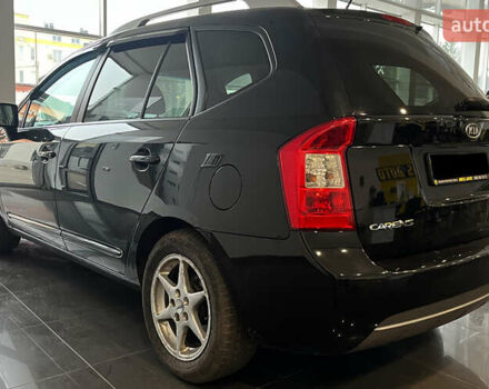 Чорний Кіа Каренс, об'ємом двигуна 1.58 л та пробігом 269 тис. км за 7500 $, фото 4 на Automoto.ua