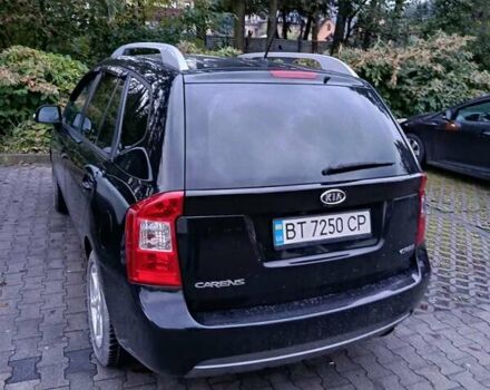 Черный Киа Каренс, объемом двигателя 1.58 л и пробегом 268 тыс. км за 6900 $, фото 3 на Automoto.ua