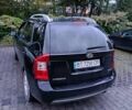 Черный Киа Каренс, объемом двигателя 1.58 л и пробегом 268 тыс. км за 6900 $, фото 3 на Automoto.ua