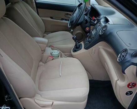 Черный Киа Каренс, объемом двигателя 1.58 л и пробегом 268 тыс. км за 6900 $, фото 1 на Automoto.ua