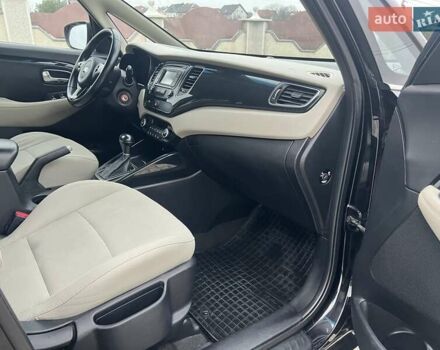 Черный Киа Каренс, объемом двигателя 1.69 л и пробегом 179 тыс. км за 10950 $, фото 94 на Automoto.ua