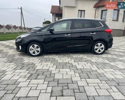 Черный Киа Каренс, объемом двигателя 1.69 л и пробегом 179 тыс. км за 10950 $, фото 44 на Automoto.ua