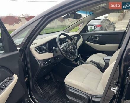 Черный Киа Каренс, объемом двигателя 1.69 л и пробегом 179 тыс. км за 10950 $, фото 118 на Automoto.ua