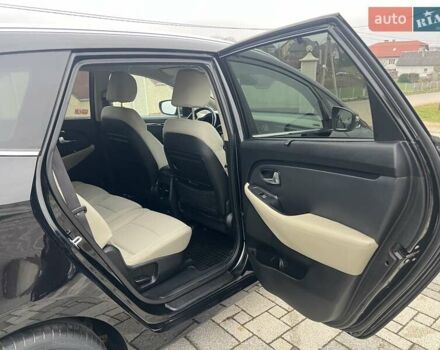 Черный Киа Каренс, объемом двигателя 1.69 л и пробегом 179 тыс. км за 10950 $, фото 100 на Automoto.ua