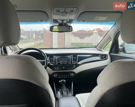 Черный Киа Каренс, объемом двигателя 1.69 л и пробегом 179 тыс. км за 10950 $, фото 79 на Automoto.ua