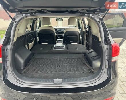 Черный Киа Каренс, объемом двигателя 1.69 л и пробегом 179 тыс. км за 10950 $, фото 140 на Automoto.ua