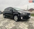 Черный Киа Каренс, объемом двигателя 1.69 л и пробегом 179 тыс. км за 10950 $, фото 57 на Automoto.ua