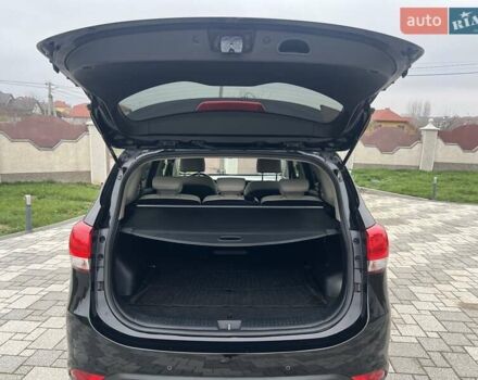 Черный Киа Каренс, объемом двигателя 1.69 л и пробегом 179 тыс. км за 10950 $, фото 126 на Automoto.ua