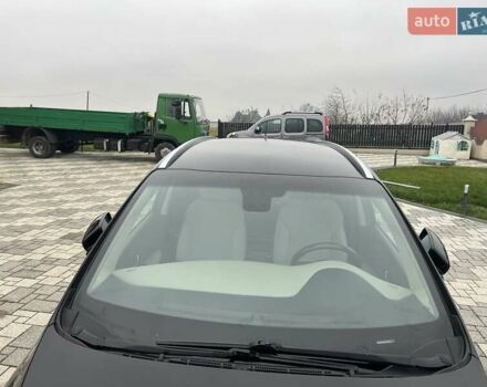 Черный Киа Каренс, объемом двигателя 1.69 л и пробегом 179 тыс. км за 10950 $, фото 170 на Automoto.ua