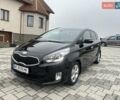 Черный Киа Каренс, объемом двигателя 1.69 л и пробегом 179 тыс. км за 10950 $, фото 1 на Automoto.ua