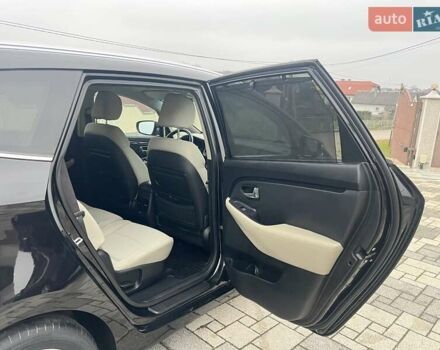 Черный Киа Каренс, объемом двигателя 1.69 л и пробегом 179 тыс. км за 10950 $, фото 97 на Automoto.ua