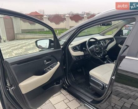 Черный Киа Каренс, объемом двигателя 1.69 л и пробегом 179 тыс. км за 10950 $, фото 62 на Automoto.ua