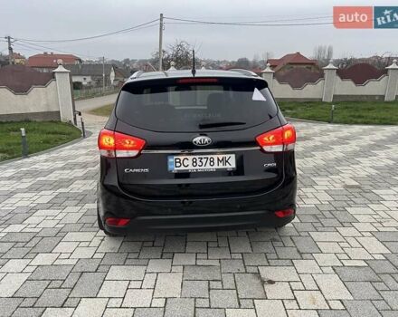 Черный Киа Каренс, объемом двигателя 1.69 л и пробегом 179 тыс. км за 10950 $, фото 10 на Automoto.ua