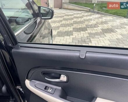 Черный Киа Каренс, объемом двигателя 1.69 л и пробегом 179 тыс. км за 10950 $, фото 102 на Automoto.ua