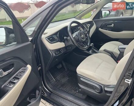 Черный Киа Каренс, объемом двигателя 1.69 л и пробегом 179 тыс. км за 10950 $, фото 119 на Automoto.ua