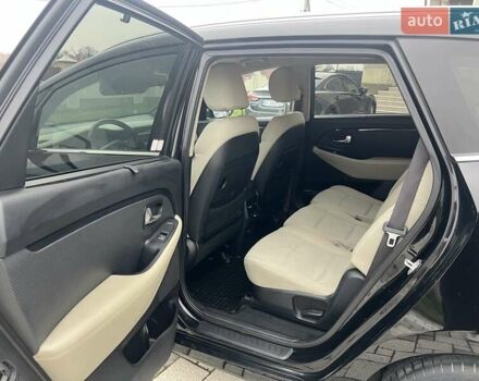 Черный Киа Каренс, объемом двигателя 1.69 л и пробегом 179 тыс. км за 10950 $, фото 76 на Automoto.ua