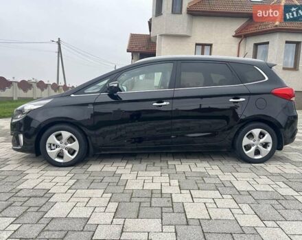 Черный Киа Каренс, объемом двигателя 1.69 л и пробегом 179 тыс. км за 10950 $, фото 43 на Automoto.ua