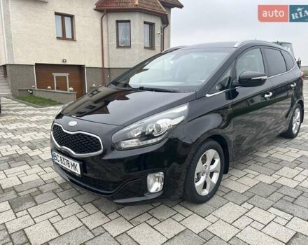 Черный Киа Каренс, объемом двигателя 1.69 л и пробегом 179 тыс. км за 10950 $, фото 52 на Automoto.ua