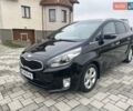 Черный Киа Каренс, объемом двигателя 1.69 л и пробегом 179 тыс. км за 10950 $, фото 52 на Automoto.ua