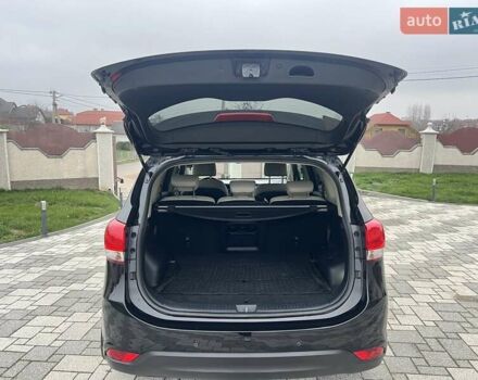 Черный Киа Каренс, объемом двигателя 1.69 л и пробегом 179 тыс. км за 10950 $, фото 123 на Automoto.ua