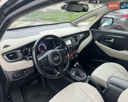 Черный Киа Каренс, объемом двигателя 1.69 л и пробегом 179 тыс. км за 10950 $, фото 176 на Automoto.ua