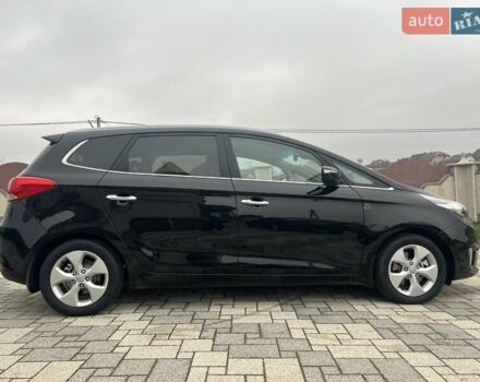 Черный Киа Каренс, объемом двигателя 1.69 л и пробегом 179 тыс. км за 10950 $, фото 56 на Automoto.ua